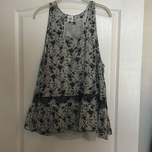 Cabi everything too. Black and white, two piece top. Size xl.